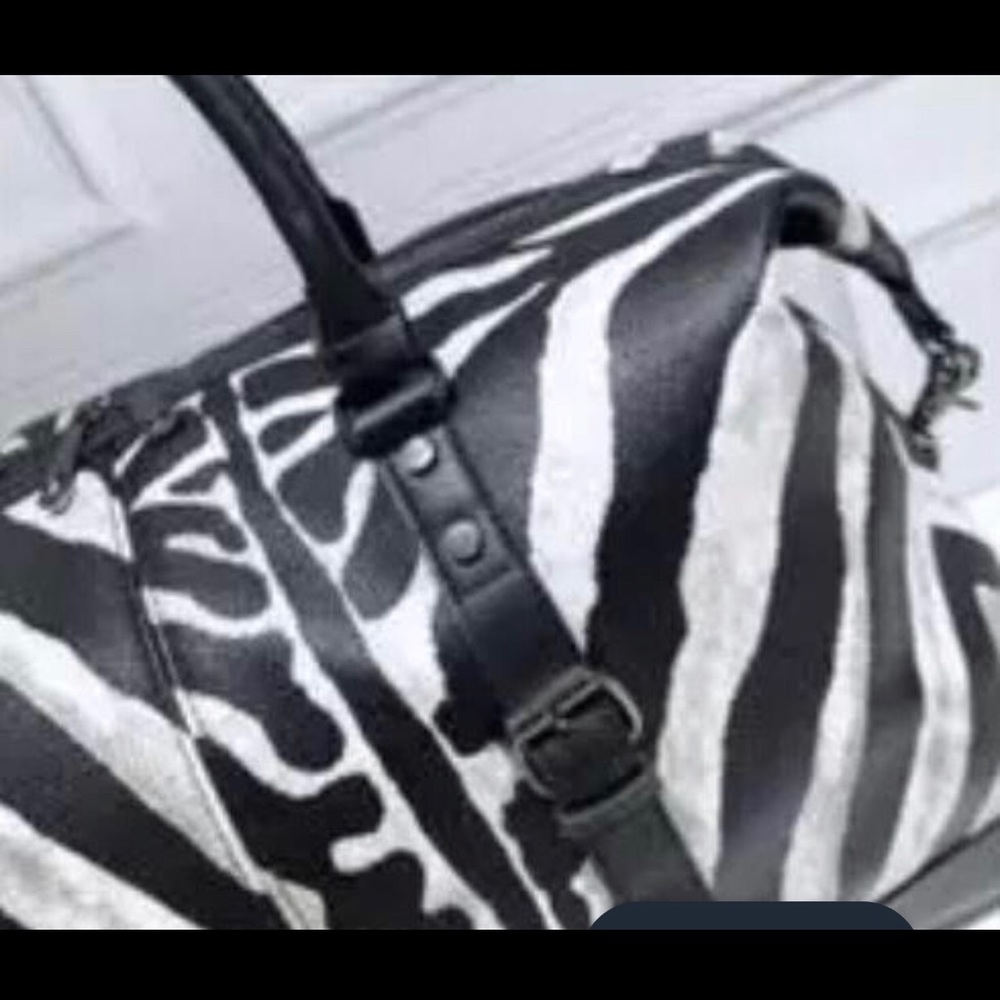 “UNTAMED  ZEBRA BAG “